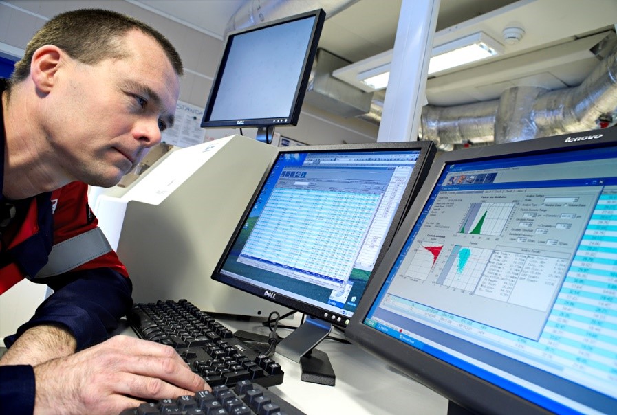 worker analyzing at computer