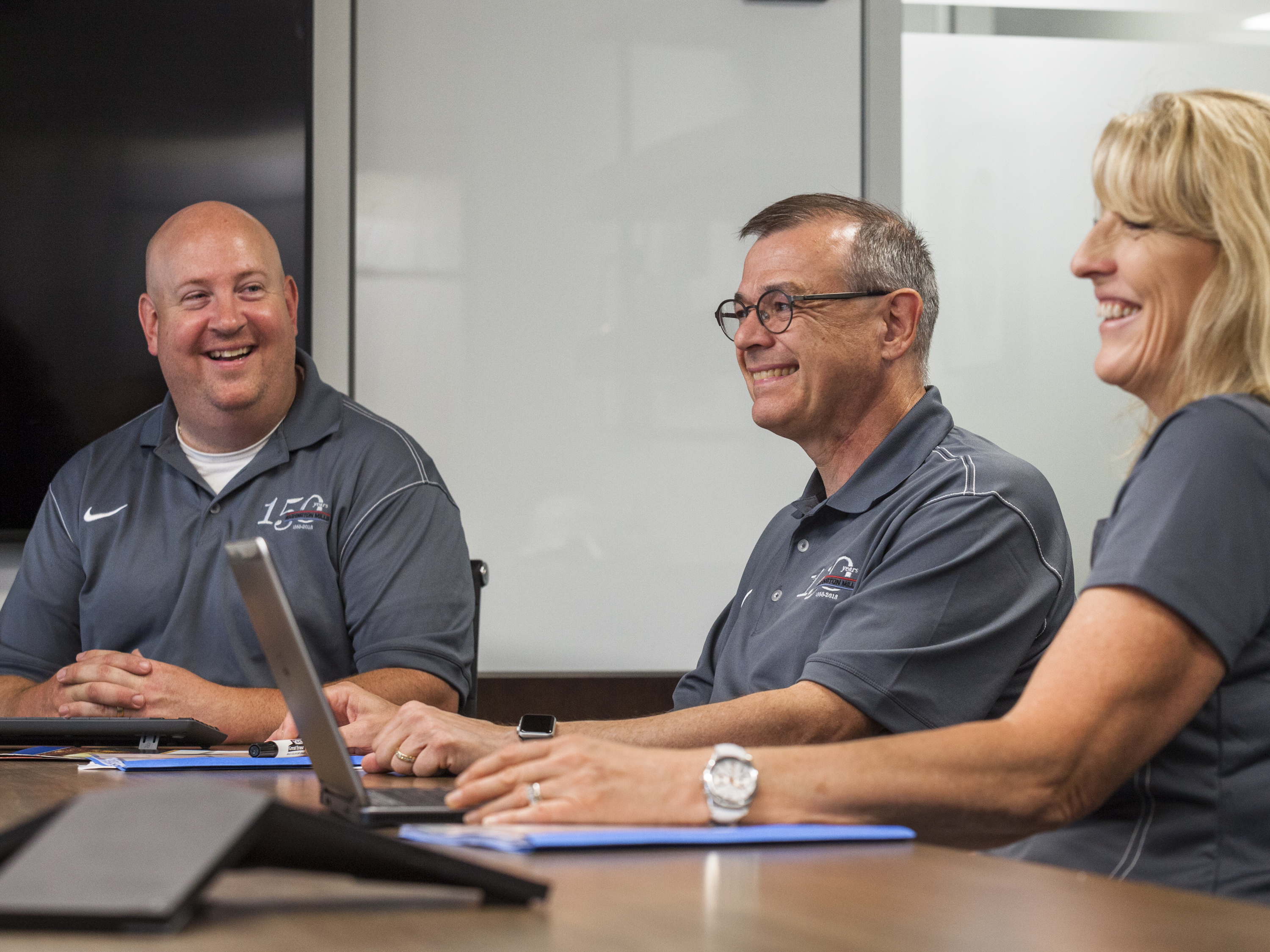 WM employees around a table