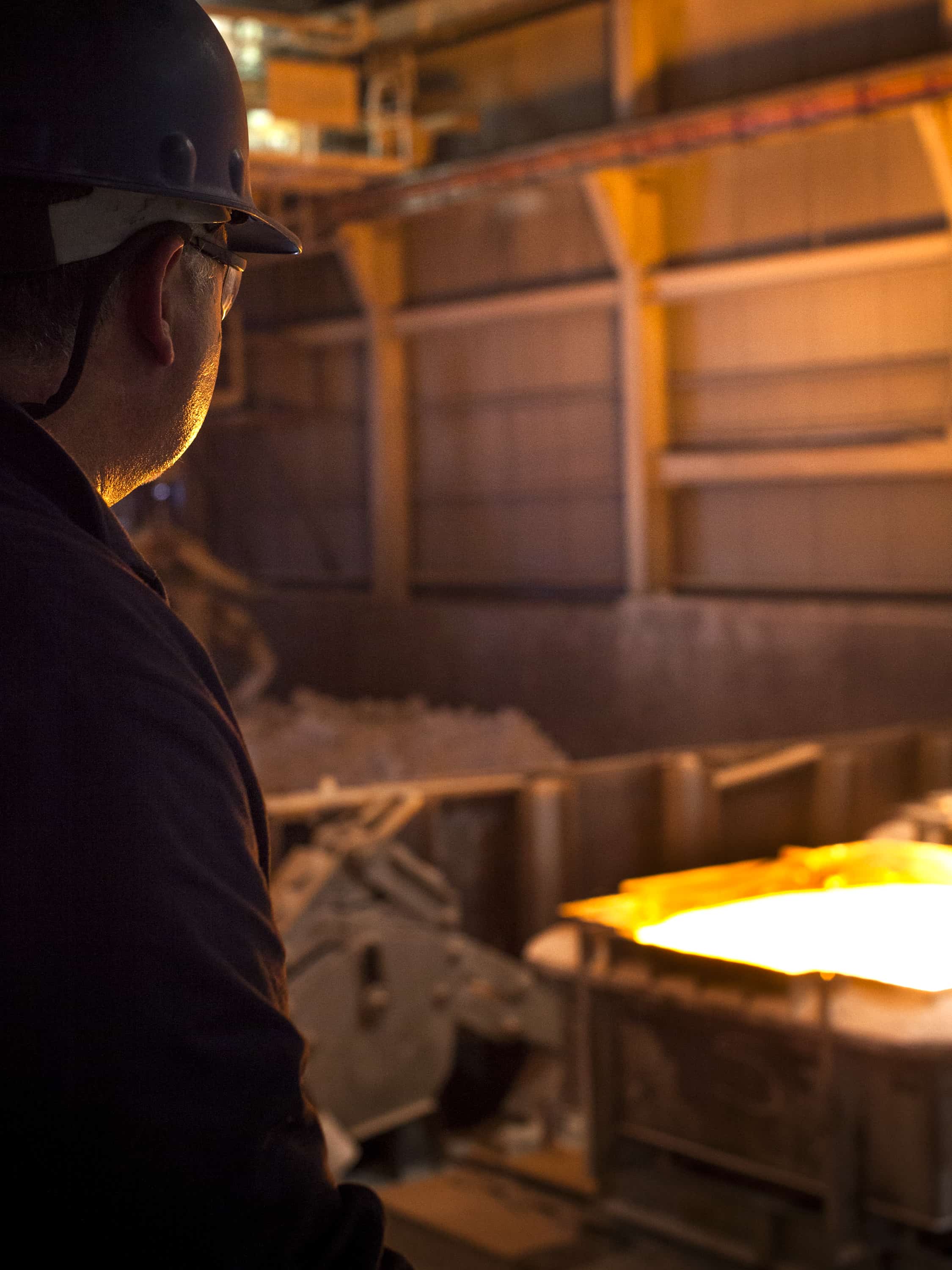 employee watching ingot