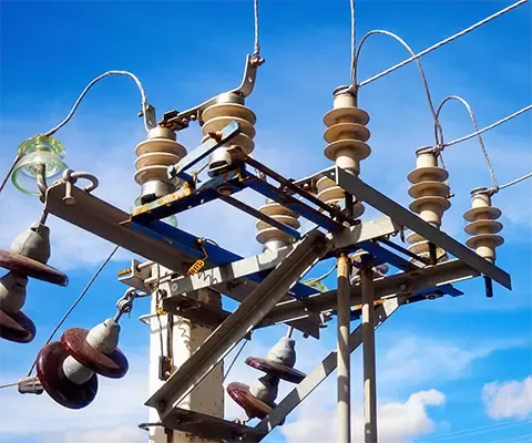 High-voltage electricity pole with ceramic insulators