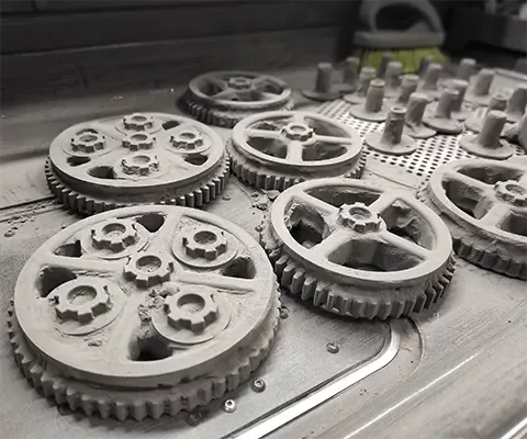 3D gears produced through an additive manufacturing process using engineered powders