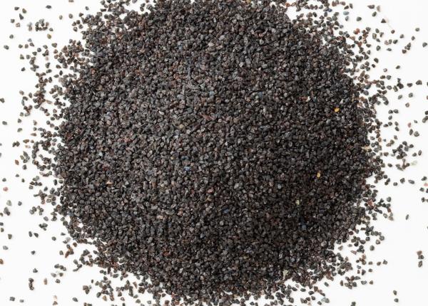 Scattered pile of brown fused aluminum oxide grain