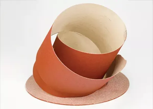 Coated abrasives, such as sandpaper and sanding discs, use abrasives to sand, polish, finish, and take rough edges off of a workpiece.
