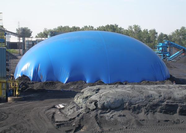 Hennepin silicon carbide furnace covered with blue tarp