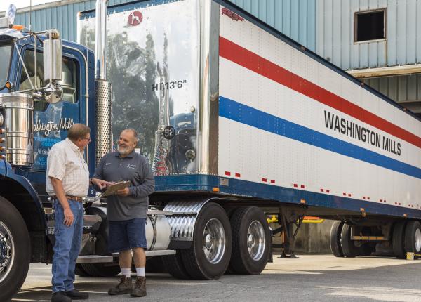 Bruce and Kenny talking at the Washington Mills truck