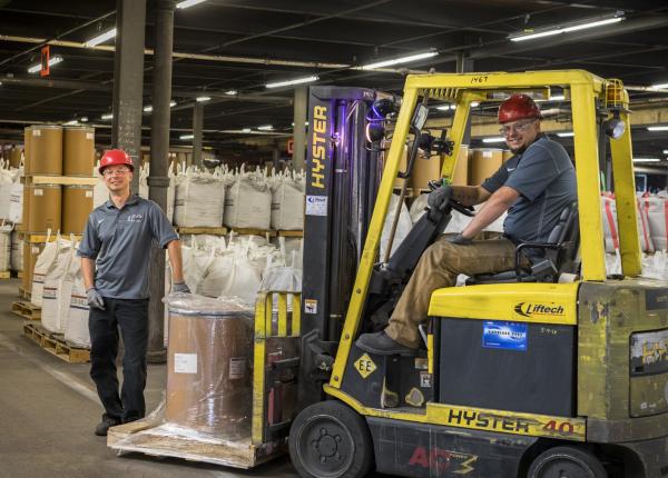 fork truck smiling people